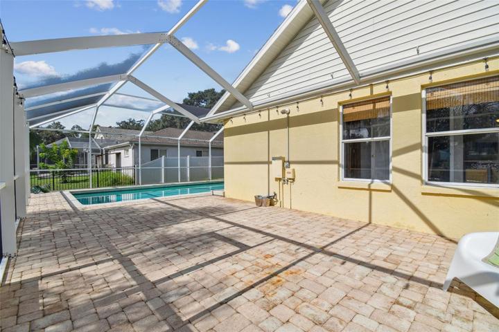 Let your creativity abound with this added pool patio area