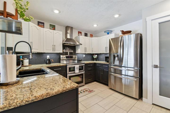 Updated Kitchen with Frosted Door Closet Pantry
