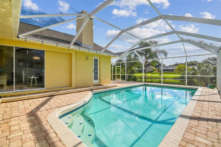 Pool View looking at sliders to Great Room and Pool Bath Entry