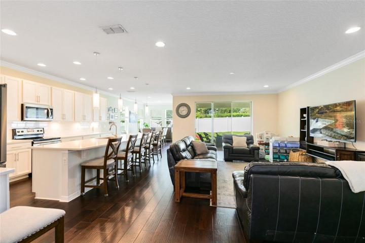 The inviting arched entryway guides you into the heart of the home.