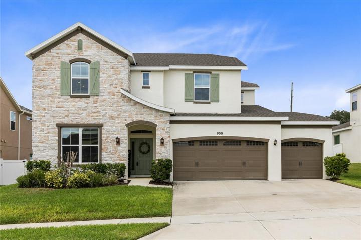 Welcome to this meticulously maintained gem nestled in the heart of a fantastic Minneola community.