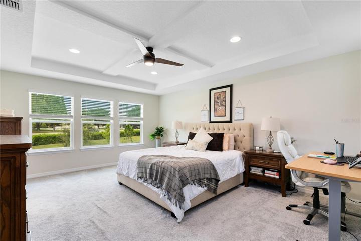 The expansive master suite awaits, an ideal place to relax and unwind.