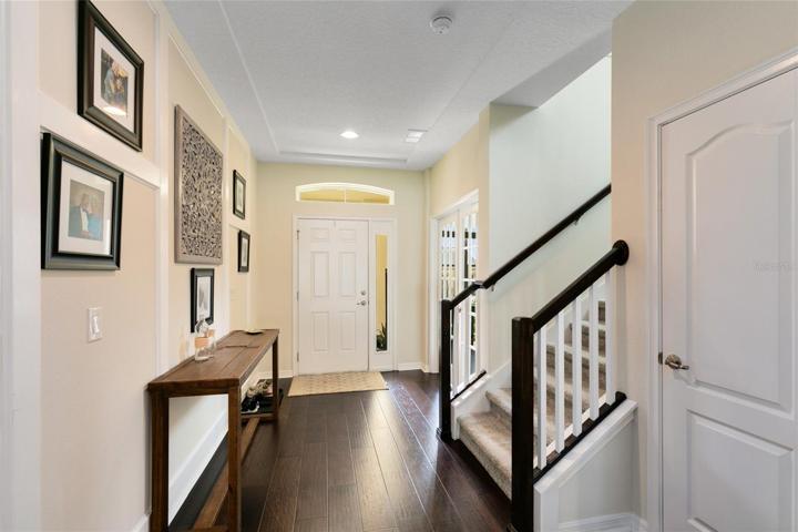 As you step into the foyer, you'll immediately sense the warmth and comfort this home exudes.