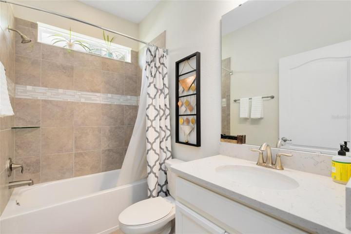 You'll find this full bath on the first floor, ideal for guest use.