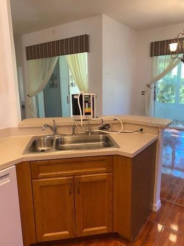 FROM KITCHEN TO DINING ROOM, NICE WOOD CABINETS.