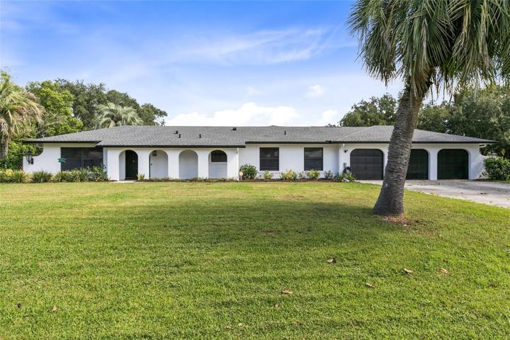 Welcome Home to This Charming Hidden Oasis with NO HOA in Winter Park! This Gorgeous Renovated One Story home sits on a .69 acre Corner Lot, plenty of room for a Boat or RV. This home is Tastefully Decorated and Meticulously Kept with Recent Updates and offers 4 bedrooms, 2 baths, 2 half baths, an oversized 3 car garage, an Open & Split Floorplan for Privacy and Versatility.
