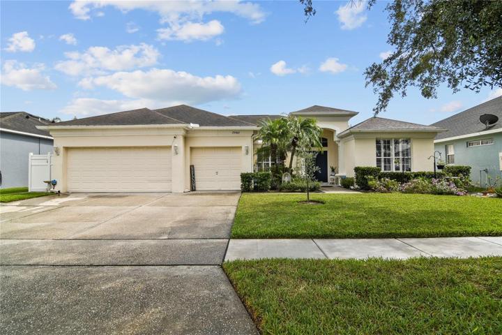 Welcome to Bridge Water in 32828 and this 4-bedroom, 3-full bath home with an OWNED SOLAR SYSTEM, UPDATED KITCHEN and BATHS, NEWER A/C (2020) and an ENCLOSED LANAI in the perfect location close to all that EAST ORLANDO has to offer!
