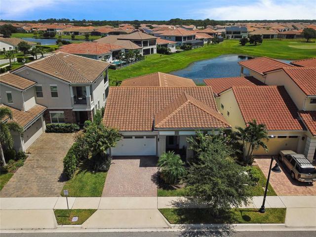 This gorgeous 4-bedroom, 3-full bath home is perfectly situated on the 15th green in the highly sought-after GATED Eagle Creek community, full of UPGRADES and ZONED FOR TOP-RATED SCHOOLS!