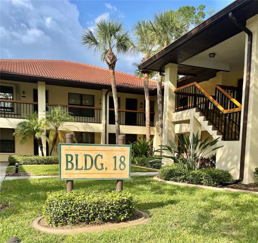 Beautifully landscaped, tile roofing and sidewalk ways to your unit