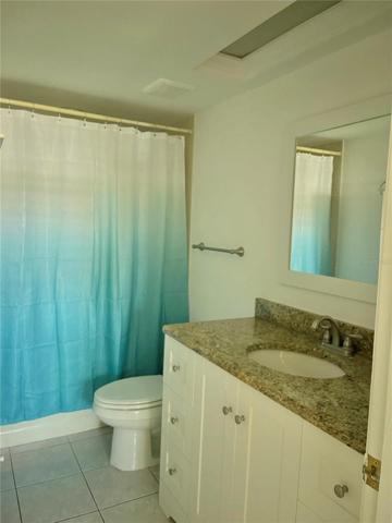 Guest Bath also washer/dryer closet