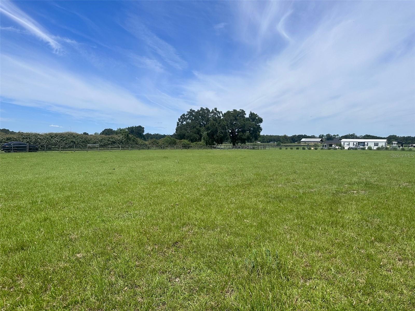 WONDERFUL PASTURE TO BUILD YOUR MINI FARM ON THESE 2 ACRES   NORTHWEST VIEW