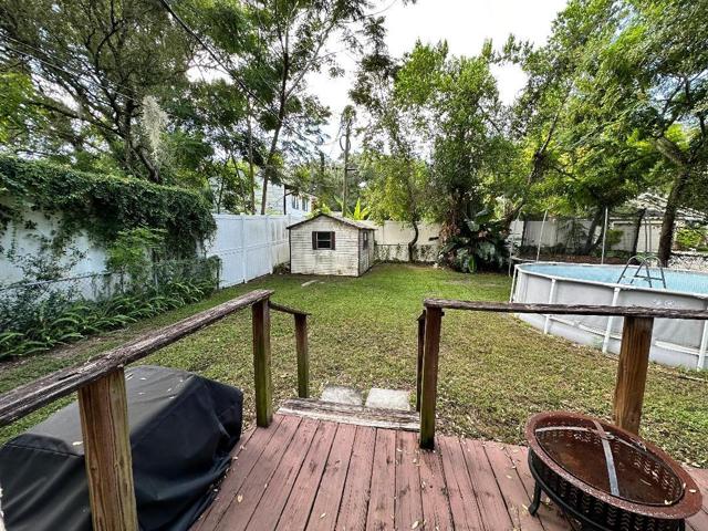Back porch and yard from back bedroom (br3)