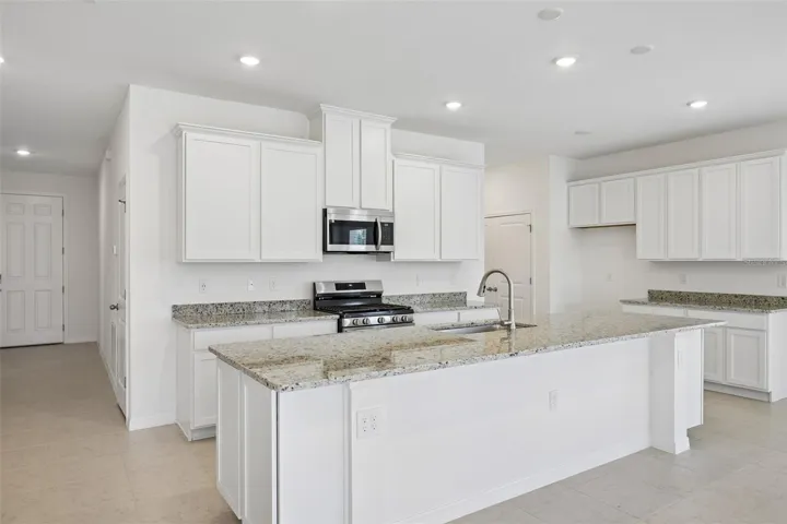 Oversized Island with Granite Countertops