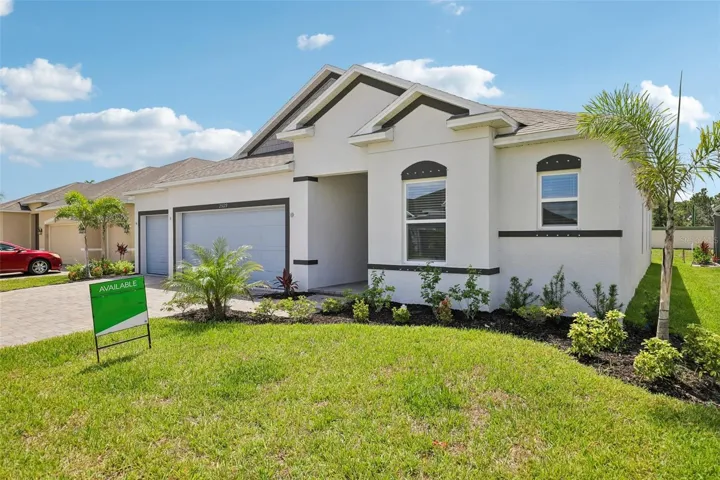 Landscaped yard - 3 car garage, brick driveaway & entry pavers