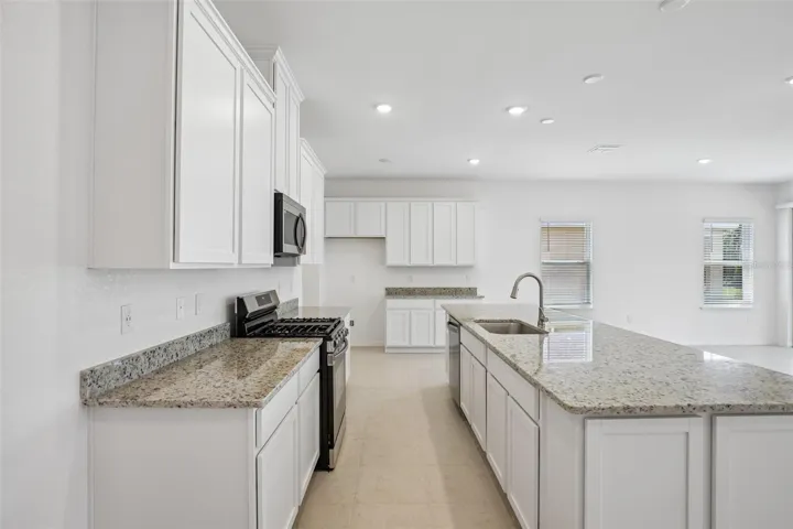 Oversized Island with Granite Countertops