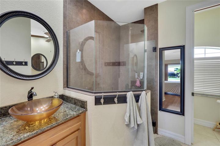 Master bathroom dual vessel sink vanities, walk-in shower and separate tub