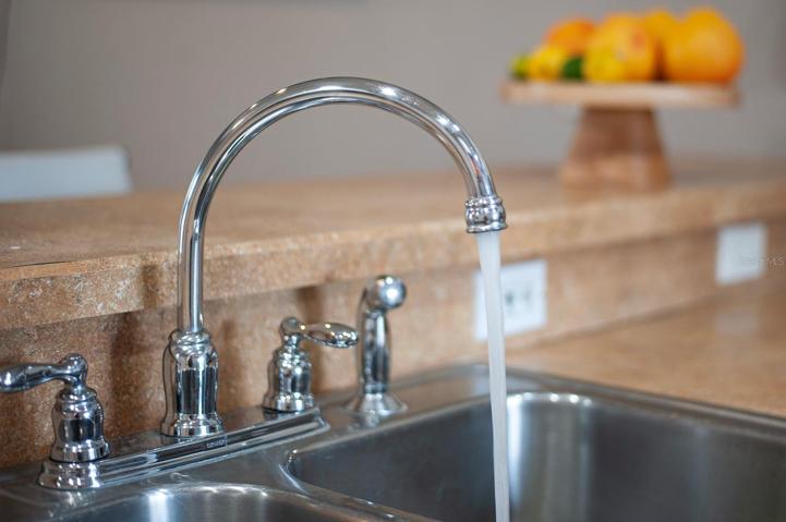 Kitchen sink with plenty of electrical outlets!