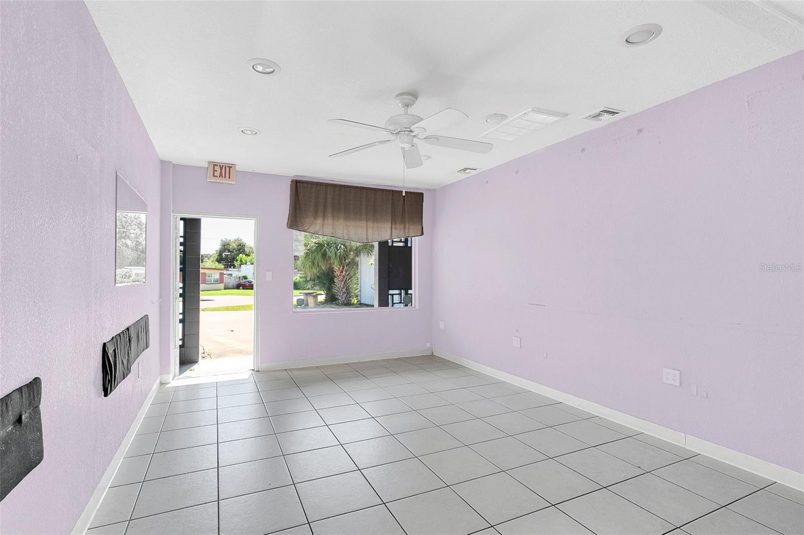 Back Door entrance Left Middle Corner. Area is 12x17 9ft Ceilings
