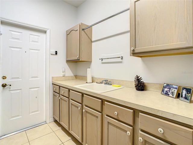Tons of Storage in Laundry Room!