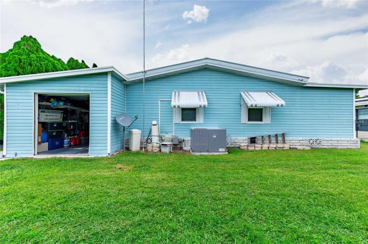 Golf cart garage is attached to the home.