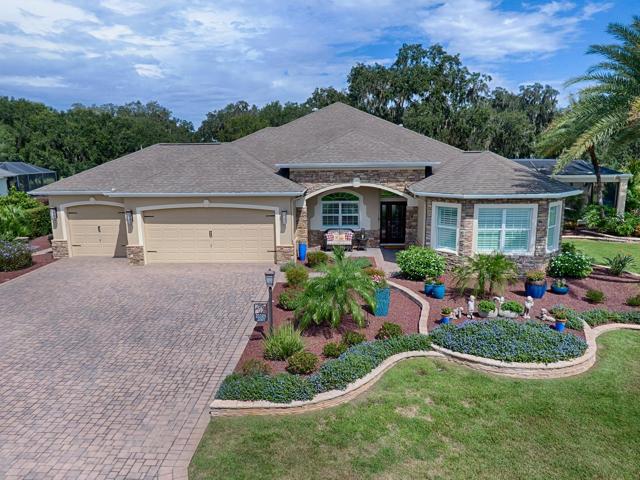 BOND PAID ON THIS SPECTACULAR GOLF COURSE VIEW 3/2 EXPANDED WILLIAMSBURG PREMIER WITH SALT WATER HEATED POOL AND SPA!