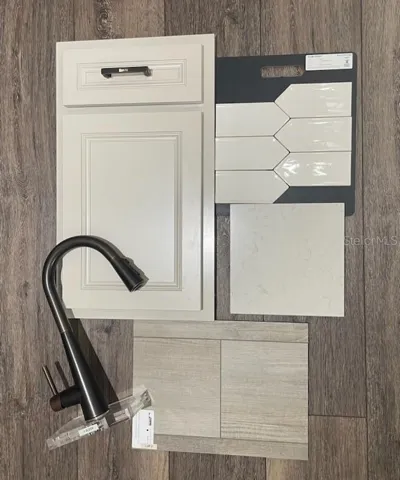 Kitchen - Professionally curated design finishes for this home. Colors, finishes, textures and options may appear differently in person due to variations in monitors and viewing devices.