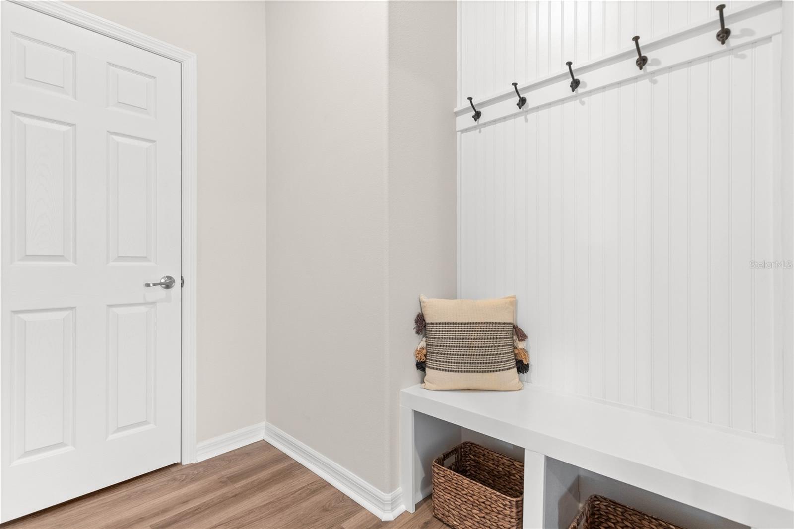 Custom stop and drop area with seating bench and storage