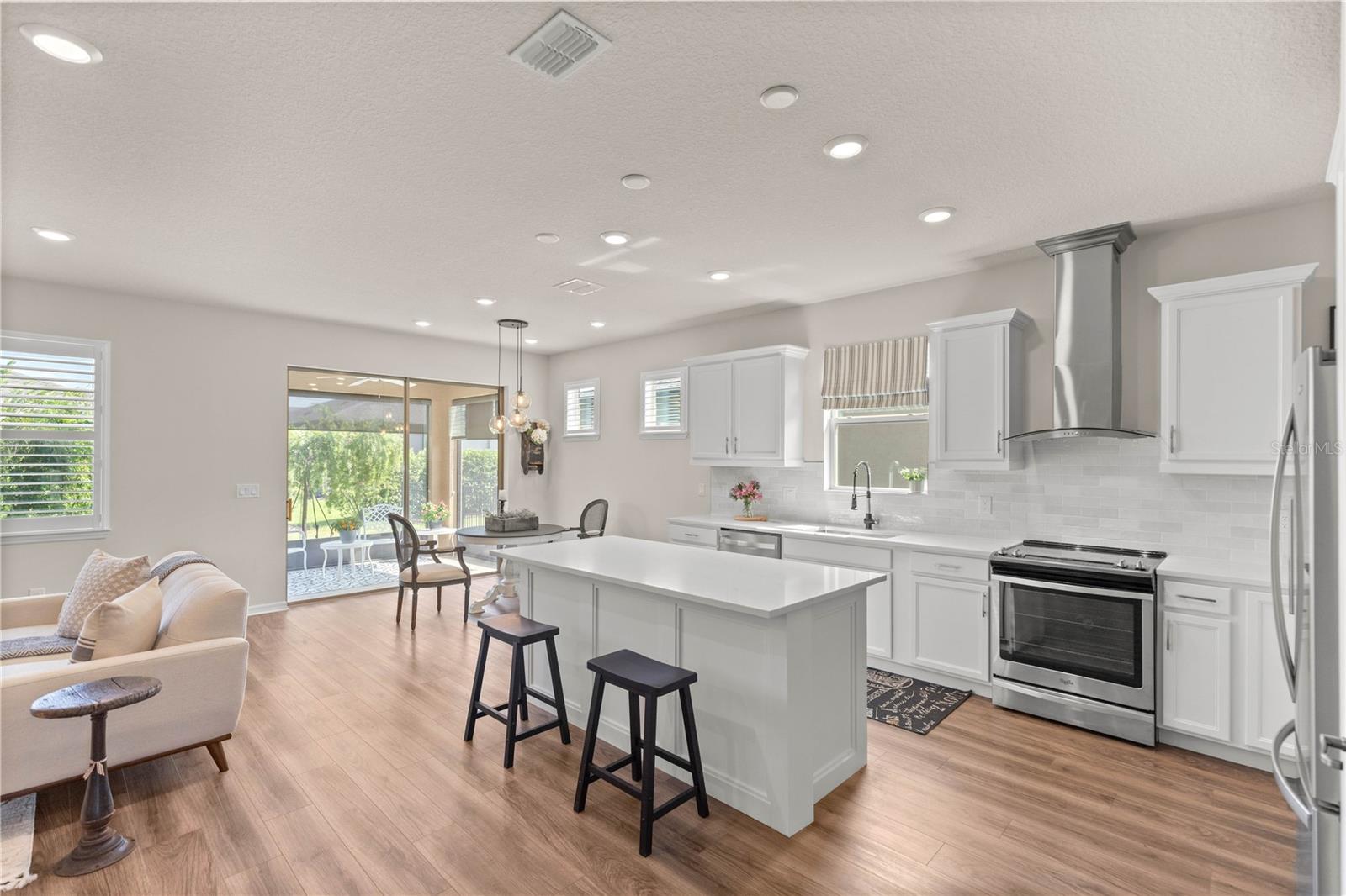 Large kitchen island with custom board and batten design.