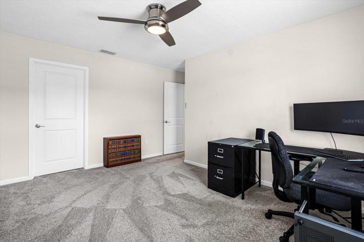 Carpet,  ceiling fan, large walk-in closet