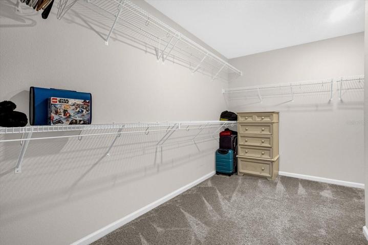 Oversized walk-in/through Owner's Closet