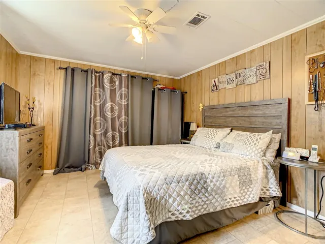 Master bedroom and closet space behind the curtains