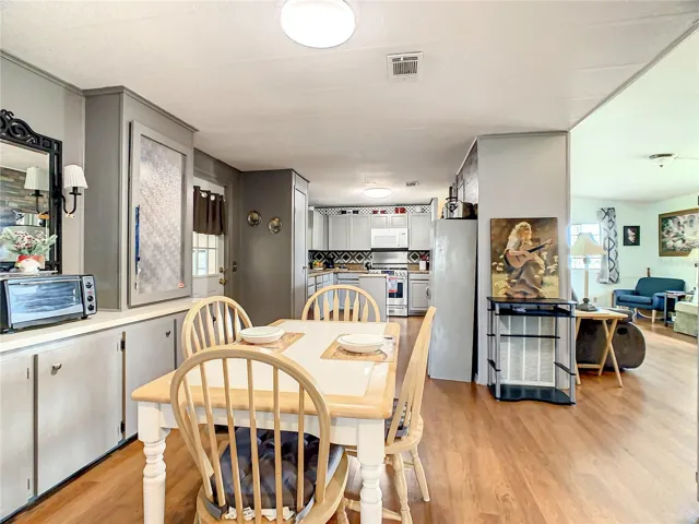 The dining area is located right off the kitchen and living room