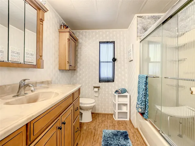 Guest bathroom with updated vanity and flooring