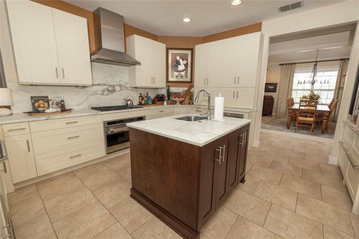 Beautiful wood cabinets and marble counters