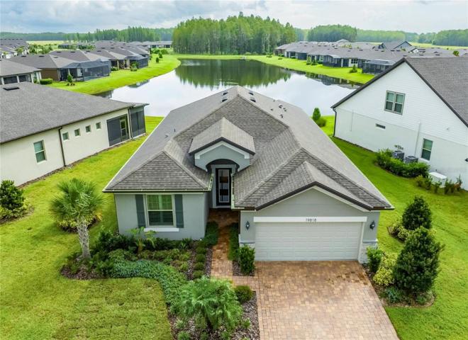 front of home overlooking pond
