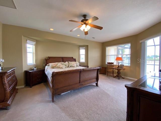 Huge Master bedroom with water & pool view