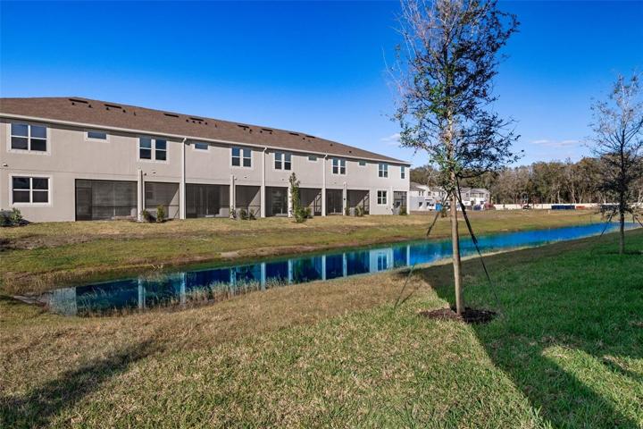 View of Back of Building on the Pond