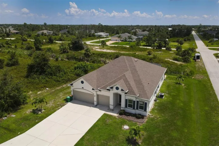 3 Car Garage/Oversized Driveway