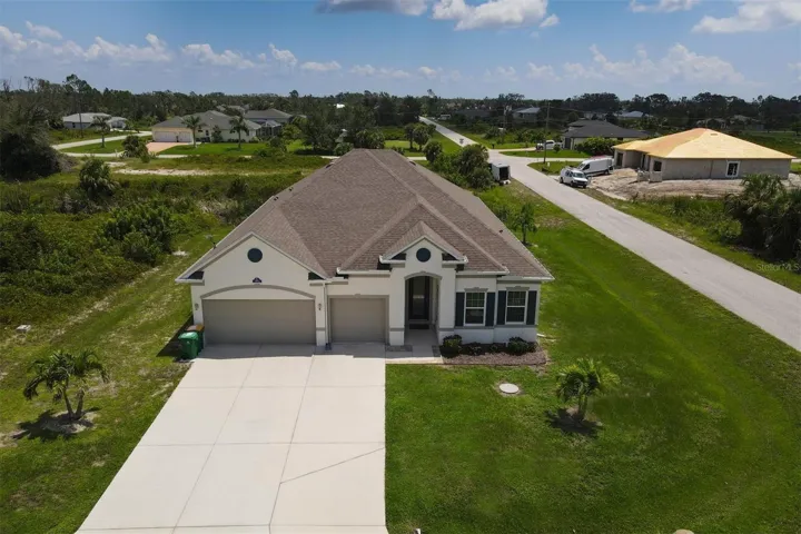 3 Car Garage/Oversized Driveway