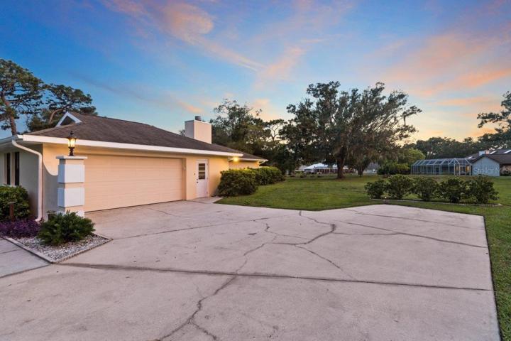 Garage entry and extended parking pad