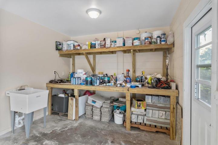 Extended two car garage Which includes an additional work area with heavy duty built-in workbench