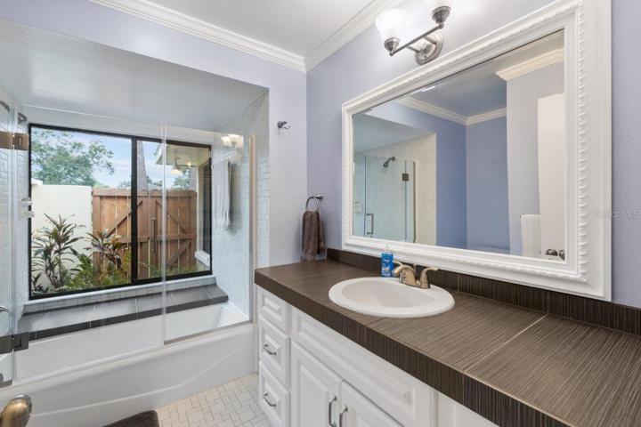 Fully remodeled Guest bathroom #2 with courtyard window.