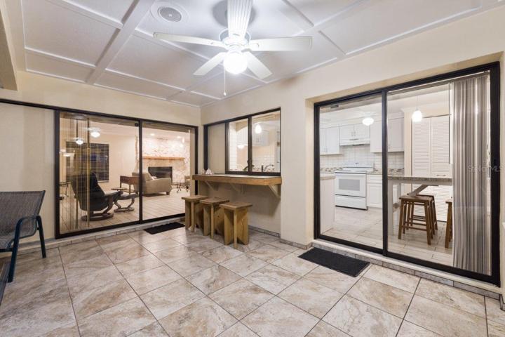 Huge Renovated Screened-in lanai with a freshly resurfaced pebble tec pool, and gorgeous views of the back yard and lake.