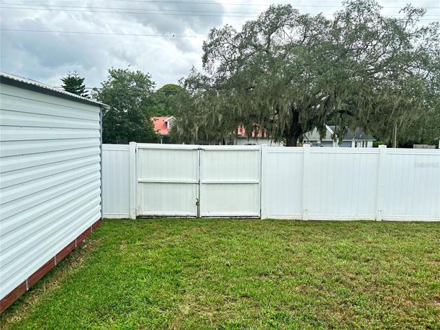 Double gate access from rear road