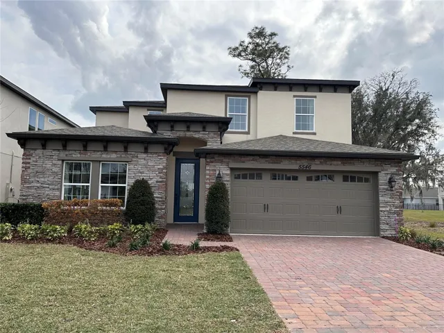 Front with Paver Driveway