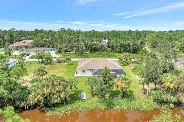 View from the canal above the home.