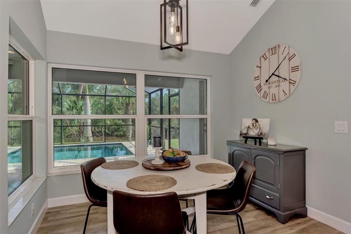 Lovely breakfast room looks right over the swimming pool!