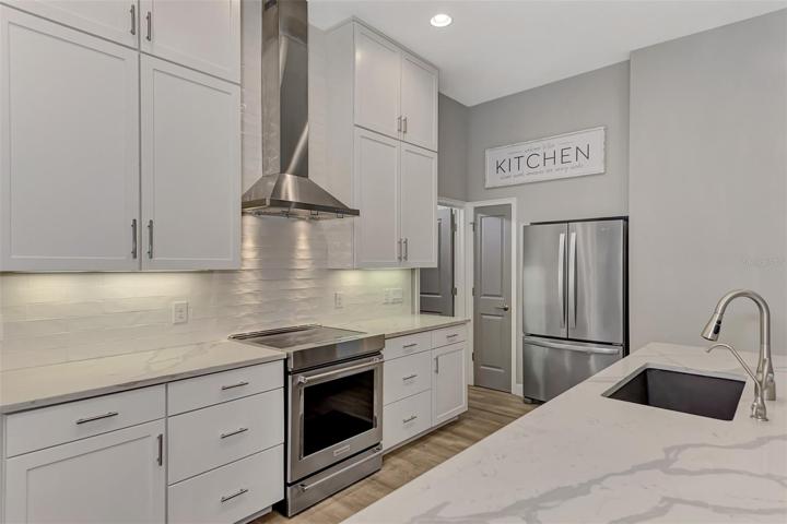 All stainless steel appliances, tiled backsplash and much more.