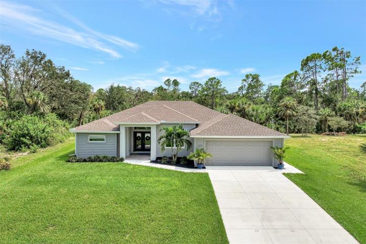 Front view of luxury 3 bedroom pool home on 3 lots!