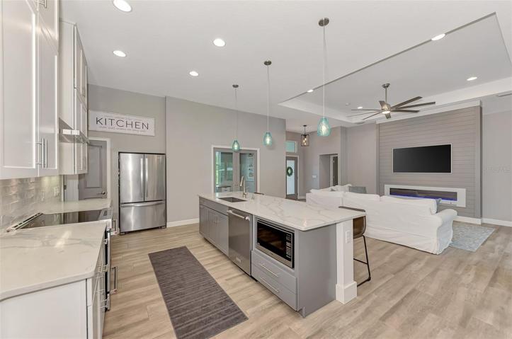 View of the oversized Quartz center island kitchen.